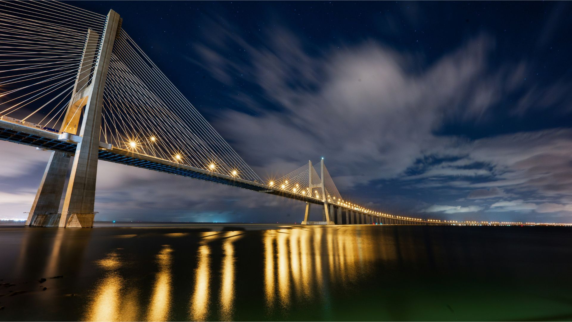 Lisbon’s riverfront at night.